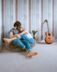 A cozy moment - with a loved one, a flower and bit of music.